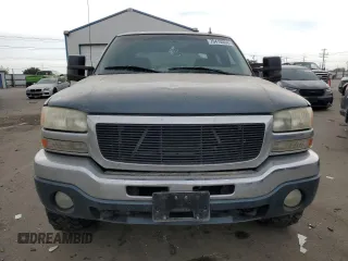 2007 GMC Sierra 1500HD SLE z VIN 1GTGK13U77F166178, wystawiony jako Copart lot #76410084 z przebiegiem 130 978 mil mil oraz Szkody całkowita. Historia ofert i sprzedaży dostępna na DreamBid. Obrazek 5.