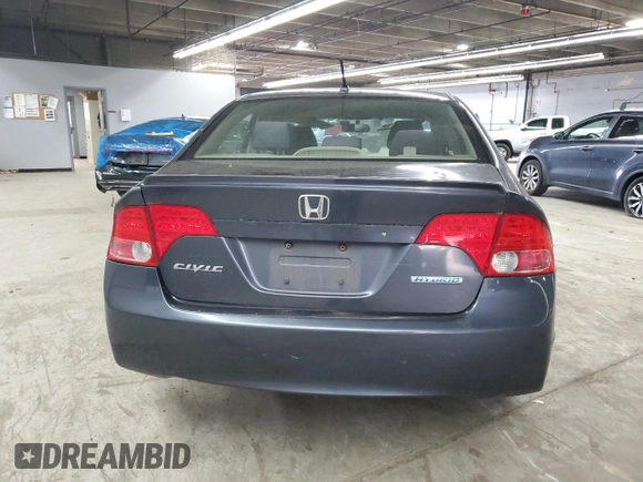 2006 Honda Civic z VIN JHMFA36256S027336, wystawiony jako Copart lot #58224335 z przebiegiem Nie podano mil oraz Szkoda całkowita • Salvage title. Historia ofert i sprzedaży dostępna na DreamBid. Obrazek 6.