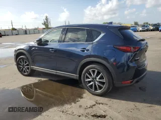 2018 Mazda CX-5 Grand Touring with VIN JM3KFADMXJ1353942, listed as a Copart auction lot 60570835 with 74,400 mi miles and Clean title. Bid and sale history available at DreamBid. Image 2.