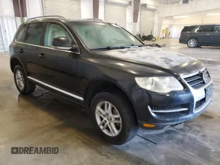 2009 Volkswagen Touareg VR6 z VIN WVGBE77L29D015958, wystawiony jako Copart lot #52019505 z przebiegiem 179 339 mil mil oraz Czysty tytuł • Clean title. Historia ofert i sprzedaży dostępna na DreamBid. Obrazek 4.
