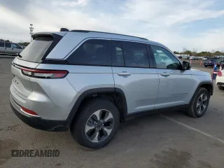 2022 Jeep Grand Cherokee with VIN 1C4RJYB66N8757210, listed as a Copart auction lot 50092995 with 11,087 mi miles and Salvage title. Bid and sale history available at DreamBid. Image 3.
