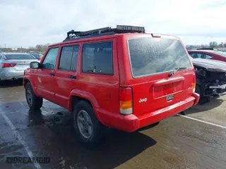1999 Jeep Cherokee Sport with VIN 1J4FT68S3XL609922, listed as a IAAI auction lot 41718509 with 345,790 mi miles. Bid and sale history available at carsss.com. Image 3.