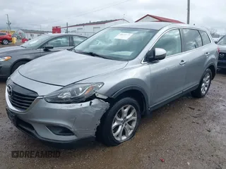2014 Mazda CX-9 Touring with VIN JM3TB3CA8E0437272, listed as a IAAI auction lot 40833160 with 153,267 mi miles. Bid and sale history available at carsss.com. Image 2.