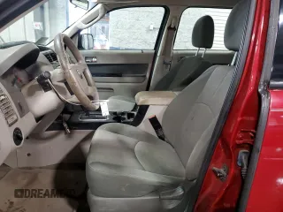 2011 Mazda Tribute Touring with VIN 4F2CY0C71BKM06780, listed as a Copart auction lot 77748114 with 144,163 mi miles and Salvage Title. Bid and sale history available at carsss.com. Image 7.