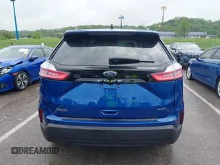 2024 Ford Edge SE z VIN 2FMPK4G93RBA72662, wystawiony jako IAAI lot #42097425 z przebiegiem 7 234 mil mil oraz . Historia ofert i sprzedaży dostępna na DreamBid. Obrazek 17.