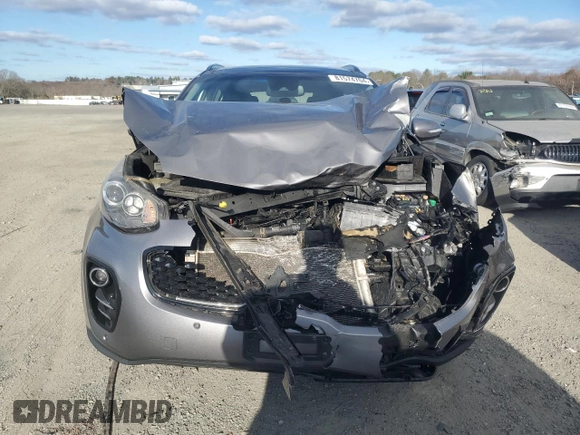 2018 Kia Sportage EX z VIN KNDPNCAC1J7308457, wystawiony jako Copart lot #81574704 z przebiegiem Nie podano mil oraz Szkoda całkowita • Salvage title. Historia ofert i sprzedaży dostępna na DreamBid. Obrazek 5.