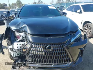 2025 Lexus NX 350h z VIN 2T2AKCEZ5SC035967, wystawiony jako IAAI lot #42301335 z przebiegiem 29 027 mil mil oraz . Historia ofert i sprzedaży dostępna na DreamBid. Obrazek 13.