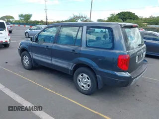 2004 Honda Pilot LX with VIN 2HKYF18114H591405, listed as a IAAI auction lot 42386073 with 71,295 mi miles and . Bid and sale history available at DreamBid. Image 3.