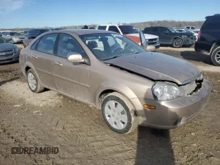 2008 Suzuki Forenza z VIN KL5JD56Z08K908143, wystawiony jako Copart lot #42985685 z przebiegiem 57 435 mil mil oraz Szkoda całkowita • Salvage title. Historia ofert i sprzedaży dostępna na DreamBid. Obrazek 4.