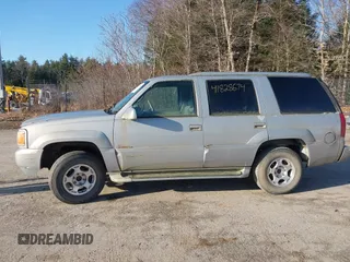 2000 GMC Denali with VIN 1GKEK13R7YR159609, listed as a IAAI auction lot 41828674 with 231,627 mi miles. Bid and sale history available at carsss.com. Image 12.