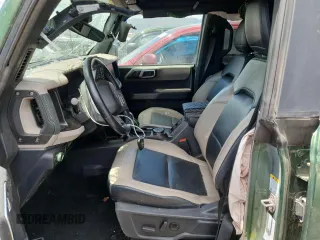 2022 Ford Bronco с VIN 1FMEE5DP0NLA72491, выставлен на аукционе Copart как лот 62482815 с пробегом 80 184 миль миль и Списание • Salvage title. История ставок и продаж доступна на DreamBid. Изображение 7.