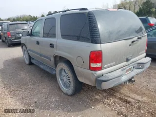 2003 Chevrolet Tahoe LS with VIN 1GNEC13V03R272663, listed as a IAAI auction lot 41933407 with 245,113 mi miles. Bid and sale history available at carsss.com. Image 3.