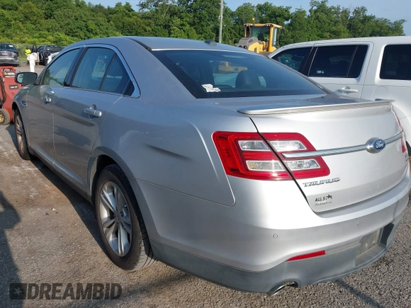 2015 Ford Taurus SEL with VIN 1FAHP2E85FG174242, listed as a IAAI auction lot 42407291 with 108,852 mi miles and . Bid and sale history available at DreamBid. Image 3.