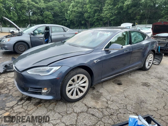 2017 Tesla Model S 60 z VIN 5YJSA1E18HF193461, wystawiony jako Copart lot #61040785 z przebiegiem 99 100 mil mil oraz Szkoda całkowita • Salvage title. Historia ofert i sprzedaży dostępna na DreamBid. Obrazek 1.