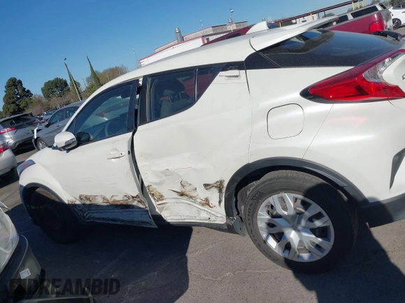 2019 Toyota C-HR XLE with VIN JTNKHMBX4K1058916, listed as a IAAI auction lot 41296963 with 113,290 mi miles. Bid and sale history available at carsss.com. Image 14.