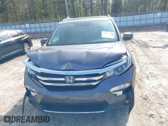 2017 Honda Pilot Touring with VIN 5FNYF5H9XHB046479, listed as a IAAI auction lot 41941449 with 162,554 mi miles. Bid and sale history available at carsss.com. Image 12.