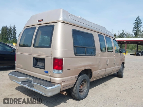 1996 Ford Econoline Cargo z VIN 1FDEE14H4THA09346, wystawiony jako IAAI lot #42108855 z przebiegiem 150 061 mil mil oraz . Historia ofert i sprzedaży dostępna na DreamBid. Obrazek 4.