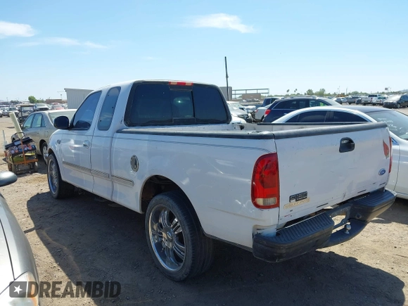 1997 Ford F-150 with VIN 1FTDX1764VKB98042, listed as a IAAI auction lot 42442450 with 203,620 mi miles and . Bid and sale history available at DreamBid. Image 3.