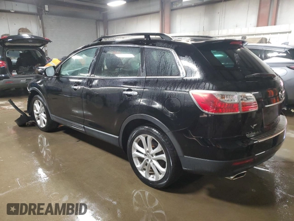 2011 Mazda CX-9 Grand Touring z VIN JM3TB3DV6B0305687, wystawiony jako Copart lot #84600794 z przebiegiem 145 844 mil mil oraz Szkoda całkowita • Salvage title. Historia ofert i sprzedaży dostępna na DreamBid. Obrazek 2.