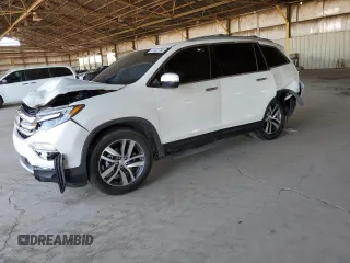 2018 Honda Pilot Touring with VIN 5FNYF6H98JB053524, listed as a Copart auction lot 61447785 with 114,942 mi miles and Salvage title. Bid and sale history available at DreamBid. Image 1.
