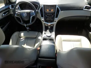 2013 Cadillac SRX Premium Collection with VIN 3GYFNJE31DS555908, listed as a Copart auction lot 58870495 with 170,880 mi miles and Clean title. Bid and sale history available at DreamBid. Image 8.