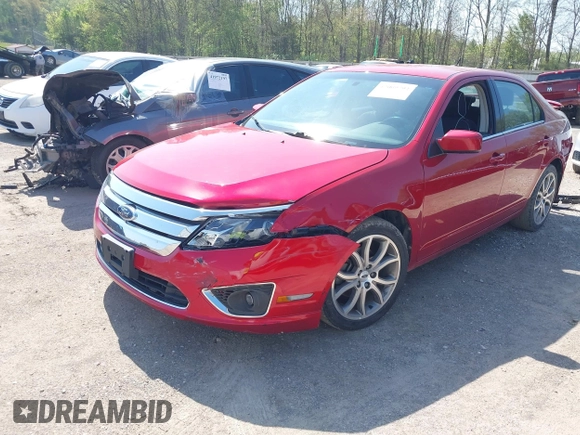 2012 Ford Fusion SE with VIN 3FAHP0HAXCR236502, listed as a IAAI auction lot 42009792 with 115,002 mi miles and . Bid and sale history available at DreamBid. Image 2.