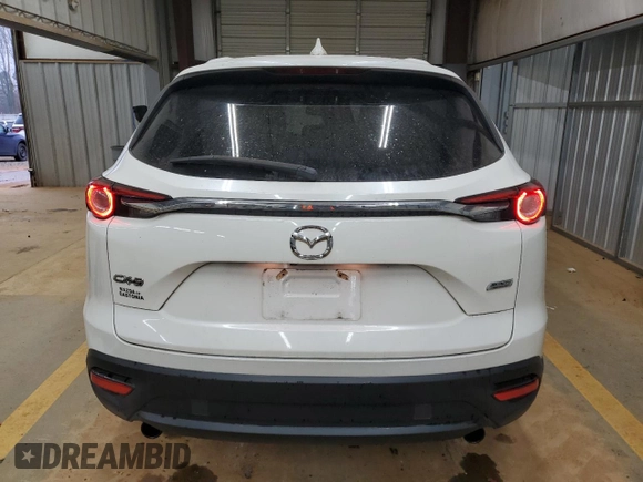 2017 Mazda CX-9 Touring z VIN JM3TCACY8H0138948, wystawiony jako Copart lot #86755594 z przebiegiem 89 828 mil mil oraz Szkoda całkowita • Salvage title. Historia ofert i sprzedaży dostępna na DreamBid. Obrazek 6.