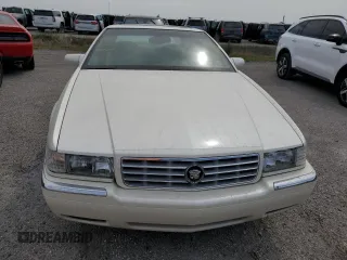 1999 Cadillac Eldorado z VIN 1G6EL12Y7XU615169, wystawiony jako Copart lot #76459744 z przebiegiem Nie podano mil oraz Szkoda całkowita • Salvage title. Historia ofert i sprzedaży dostępna na DreamBid. Obrazek 5.