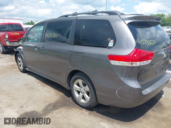 2014 Toyota Sienna LE AAS with VIN 5TDKK3DC3ES435091, listed as a IAAI auction lot 42735534 with 150,132 mi miles and . Bid and sale history available at DreamBid. Image 3.