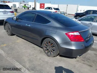 2009 Honda Accord Cpe EX-L with VIN 1HGCS22859A004074, listed as a IAAI auction lot 41590821 with 164,101 mi miles. Bid and sale history available at carsss.com. Image 3.