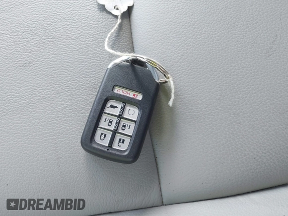 2024 Honda Odyssey EX-L with VIN 5FNRL6H65RB069145, listed as a IAAI auction lot 42120381 with 15,207 mi miles and . Bid and sale history available at DreamBid. Image 11.