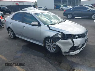 2012 Kia Forte SX with VIN KNAFW4A3XC5589300, listed as a IAAI auction lot 41714687 with 304,477 mi miles. Bid and sale history available at carsss.com. Image 1.