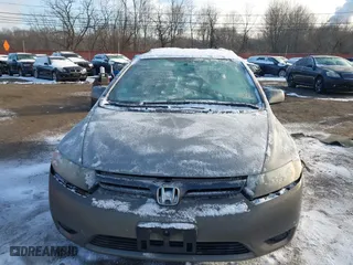2008 Honda Civic Cpe EX-L with VIN 2HGFG12918H518666, listed as a IAAI auction lot 41373407 with 218,852 mi miles. Bid and sale history available at carsss.com. Image 12.