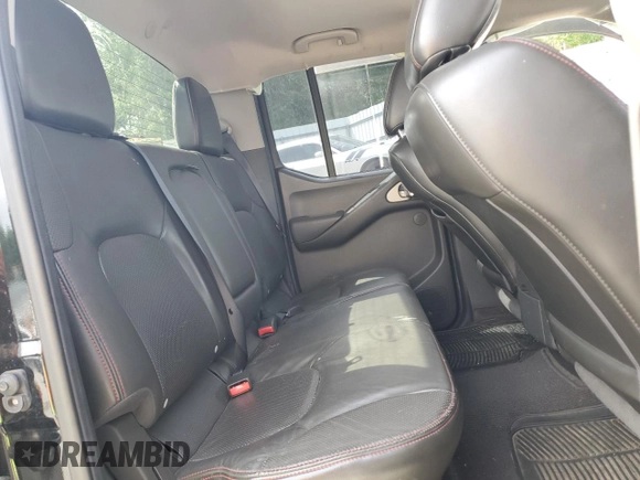 2012 Nissan Frontier Pro-4X z VIN 1N6AD0EV4CC405470, wystawiony jako Copart lot #54186715 z przebiegiem Nie podano mil oraz Szkoda całkowita • Salvage title. Historia ofert i sprzedaży dostępna na DreamBid. Obrazek 10.