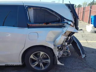 2018 Honda Odyssey Touring with VIN 5FNRL6H8XJB019122, listed as a IAAI auction lot 41820212 with 144,014 mi miles. Bid and sale history available at carsss.com. Image 19.