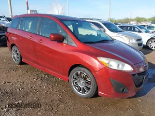2012 Mazda 5 Grand Touring z VIN JM1CW2DL5C0134521, wystawiony jako IAAI lot #42138375 z przebiegiem 227 485 mil mil oraz . Historia ofert i sprzedaży dostępna na DreamBid. Obrazek 1.
