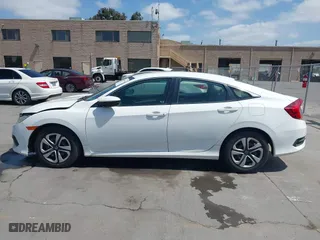 2016 Honda Civic Sedan LX with VIN 19XFC2F54GE215012, listed as a IAAI auction lot 42046334 with 146,348 mi miles. Bid and sale history available at carsss.com. Image 14.