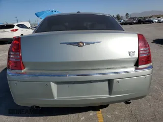 2006 Chrysler 300 C z VIN 2C3LA63H66H408557, wystawiony jako Copart lot #57797005 z przebiegiem 71 932 mil mil oraz Szkoda całkowita • Salvage title. Historia ofert i sprzedaży dostępna na DreamBid. Obrazek 6.