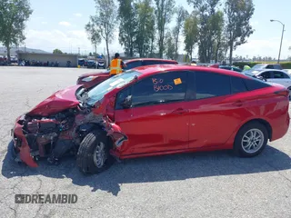 2020 Toyota Prius L Eco z VIN JTDKARFU0L3109596, wystawiony jako IAAI lot #41950366 z przebiegiem Nie podano mil oraz . Historia ofert i sprzedaży dostępna na DreamBid. Obrazek 13.