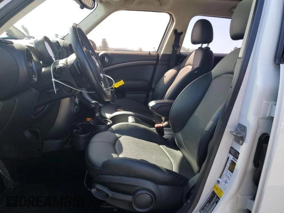 2014 MINI Countryman S with VIN WMWZC3C5XEWP25792, listed as a Copart auction lot 58583455 with 83,831 mi miles and Salvage title. Bid and sale history available at DreamBid. Image 7.