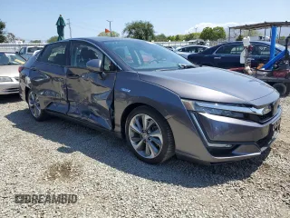 2018 Honda Clarity Touring z VIN JHMZC5F36JC014495, wystawiony jako Copart lot #56139675 z przebiegiem 75 020 mil mil oraz Szkoda całkowita • Salvage title. Historia ofert i sprzedaży dostępna na DreamBid. Obrazek 4.
