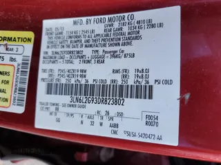 2013 Lincoln MKZ z VIN 3LN6L2G93DR823802, wystawiony jako Copart lot #56592525 z przebiegiem 176 574 mil mil oraz Szkoda całkowita • Salvage title. Historia ofert i sprzedaży dostępna na DreamBid. Obrazek 12.