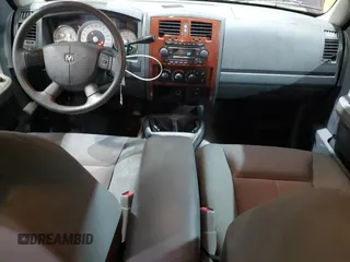 2005 Dodge Dakota SLT z VIN 1D7HW48N85S309502, wystawiony jako Copart lot #44729525 z przebiegiem 126 375 mil mil oraz Szkoda całkowita • Salvage title. Historia ofert i sprzedaży dostępna na DreamBid. Obrazek 8.