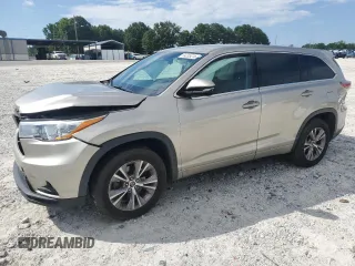 2016 Toyota Highlander LE Plus with VIN 5TDZKRFH4GS137601, listed as a Copart auction lot 64205215 with 126,773 mi miles and Salvage title. Bid and sale history available at DreamBid. Image 1.
