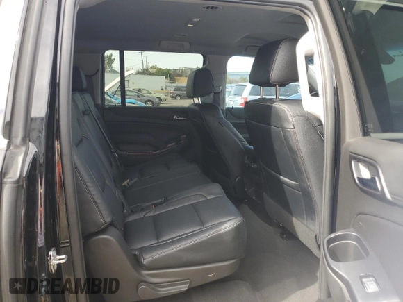 2019 Chevrolet Suburban LS z VIN 1GNSCGKC2KR297407, wystawiony jako Copart lot #75224194 z przebiegiem 93 562 mil mil oraz Szkoda całkowita • Salvage title. Historia ofert i sprzedaży dostępna na DreamBid. Obrazek 11.