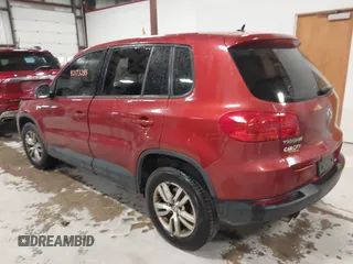 2014 Volkswagen Tiguan S z VIN WVGBV3AXXEW045826, wystawiony jako IAAI lot #42173285 z przebiegiem 126 260 mil mil oraz . Historia ofert i sprzedaży dostępna na DreamBid. Obrazek 3.