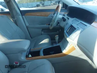 2007 Toyota Avalon XL with VIN 4T1BK36B57U241449, listed as a IAAI auction lot 42035298 with 199,662 mi miles. Bid and sale history available at carsss.com. Image 5.