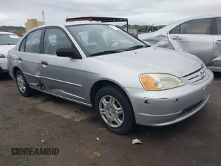 2001 Honda Civic LX with VIN 2HGES15561H561957, listed as a IAAI auction lot 41487631 with 214,529 mi miles. Bid and sale history available at carsss.com. Image 1.
