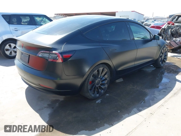 2022 Tesla Model 3 Performance with VIN 5YJ3E1EC6NF104475, listed as a IAAI auction lot 41734724 with 31,717 mi miles and . Bid and sale history available at carsss.com. Image 4.