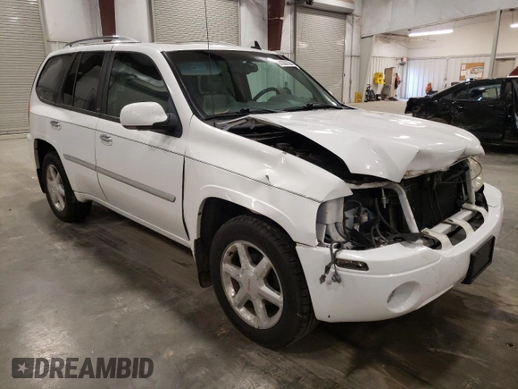 2009 GMC Envoy SLT with VIN 1GKDT43S492124405, listed as a Copart auction lot 81337354 with 154,045 mi miles and Salvage Title. Bid and sale history available at carsss.com. Image 4.